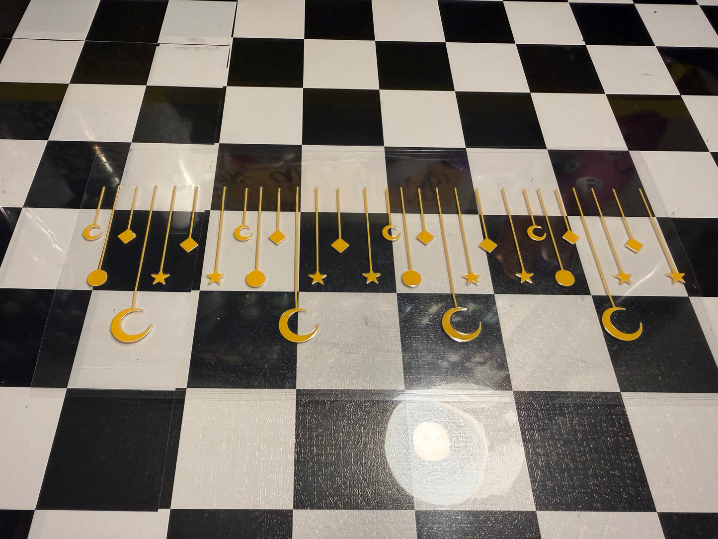 Dangling Moon and Sun